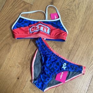 Betty Designs swimwear for Triathlon, volleyball, water sports, paddle boarding